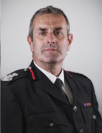 Head and shoulders portrait of Phil Garrigan OBE